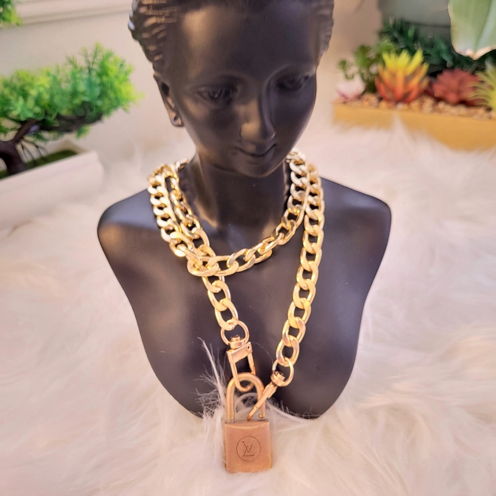 #215 AuthenticVintage  Louis Vuitton Padlock 200 series (chain included no key)…